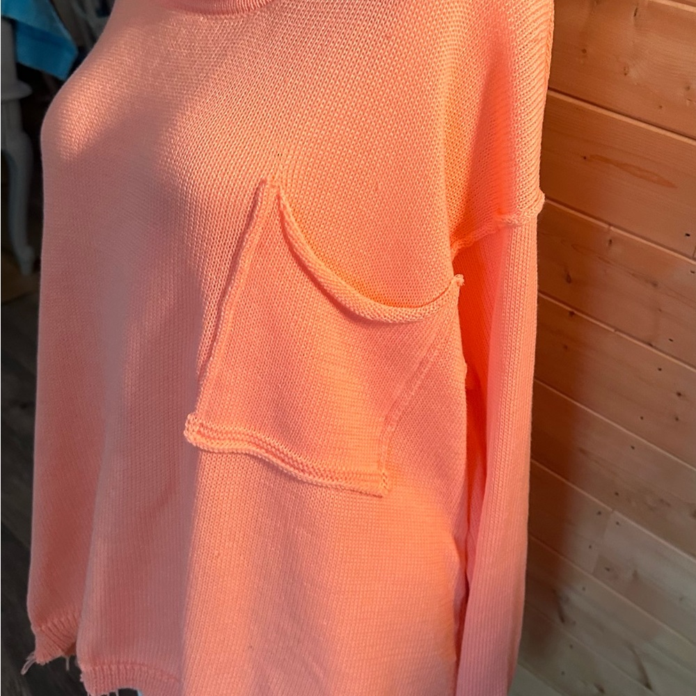 Oversized easel lightweight sweater with raw hem. NWT! Would fit a medium easy!